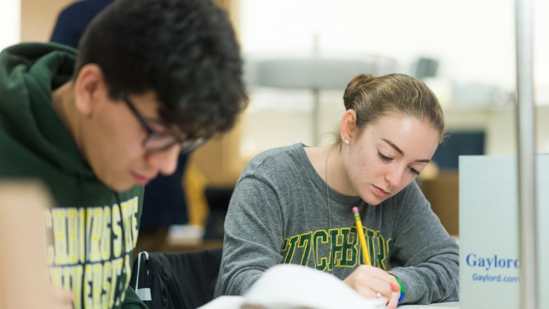 Students work in the library archive