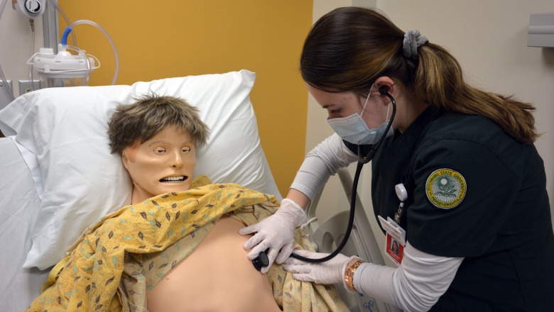 Nursing student in sim lab