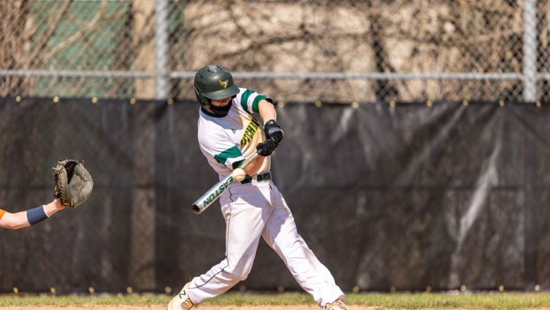 Action shot of baseball player Brad Keefe 23