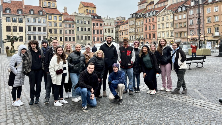 Students on the Heart of Europe Study Abroad Trip in a courtyard
