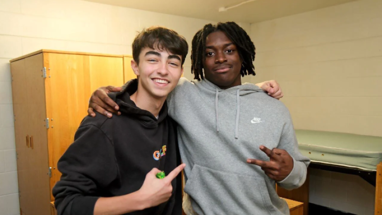 Roommates smile at camera at First Look Friday