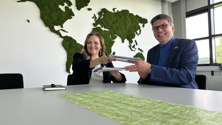 President Hodge and Rhine-Waal President Locker Grutjen signing exchange agreement May 2025