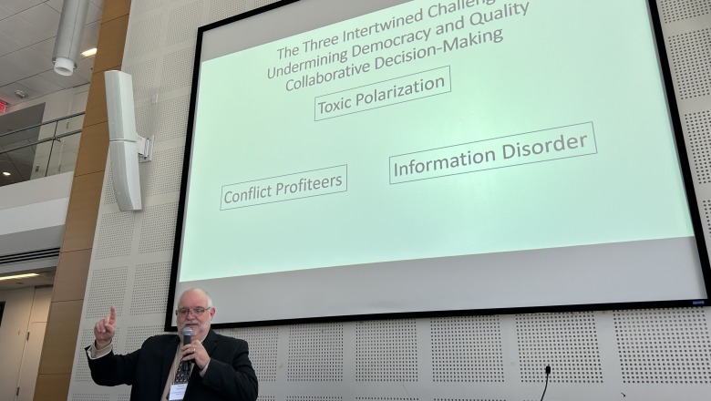 Presenter Martín Carcasson speaks at civic engagement forum in October 2025