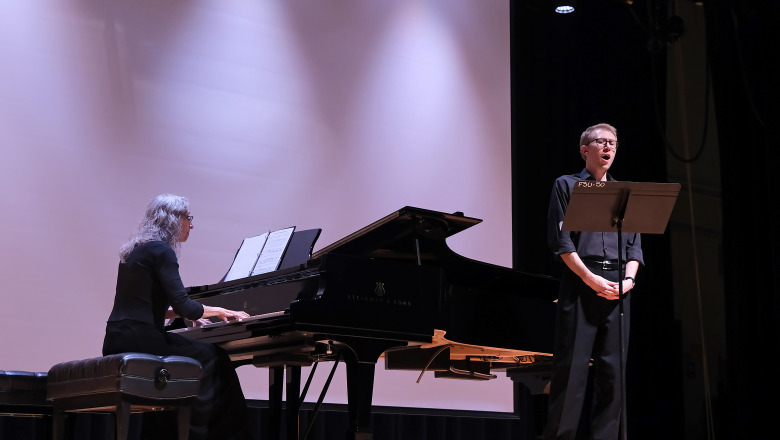 Faculty recital signing by Jonathan Harvey