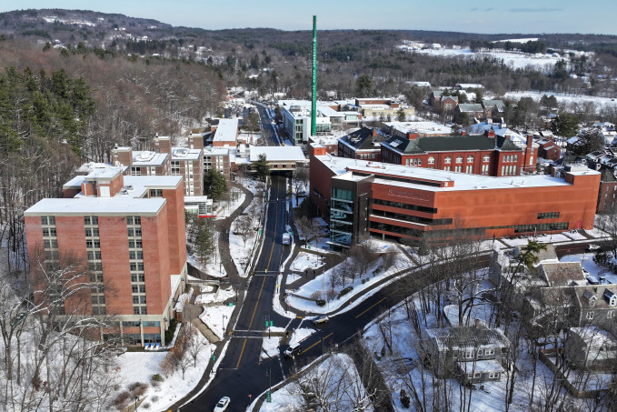 Aerial view of snowy campus.