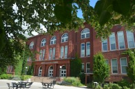 Thompson Hall exterior with leaves