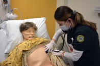 Nursing student in sim lab