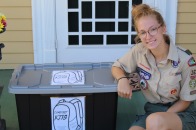 Erin Donelan poses with one of the comfort kits she created for her Eagle Scout project