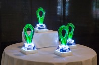Faculty award trophies on a table