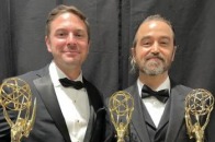 Emmy winning alumnus Gregg Swiatlowski, left, with his award