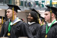 Students at end of winter commencement two male and two females