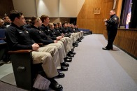 Police Chief Martineau with police students in Weston Auditorium