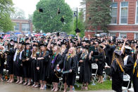 Photos of graduates tossing caps after commencement