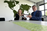 President Hodge and Rhine-Waal President Locker Grutjen signing exchange agreement May 2025