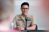 Military Friendly School designation former student in Marines seated