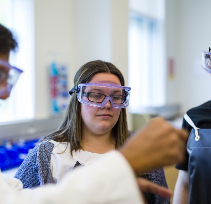 Chemistry faculty and students in lab