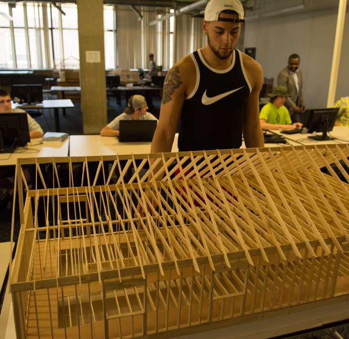 student with construction project