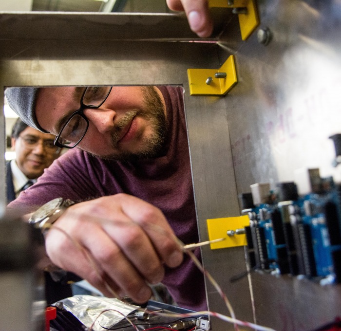 student in electronics engineering class