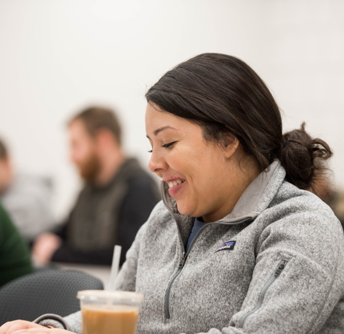 Female student smiling in classroom