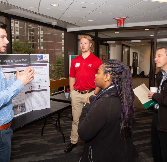 A student shows his presentation