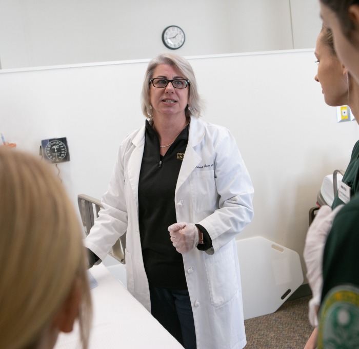 Teacher addresses nursing class