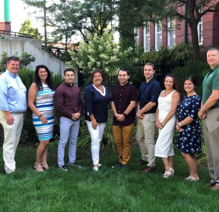 The staff of Office of Student Development standing outside