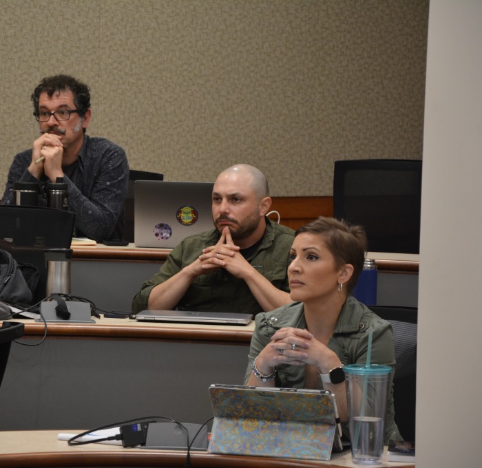 Faculty members in classroom during academy training