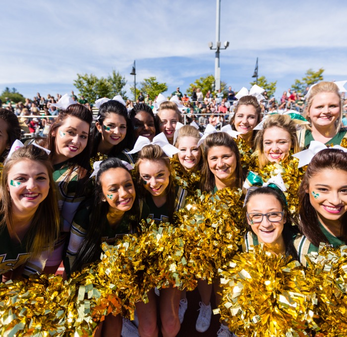 Closeup of cheerleaders at Homecoming