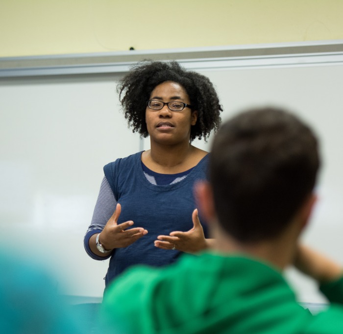 DeMisty Bellinger-Delfeld from English Studies teaching in front of a classroom