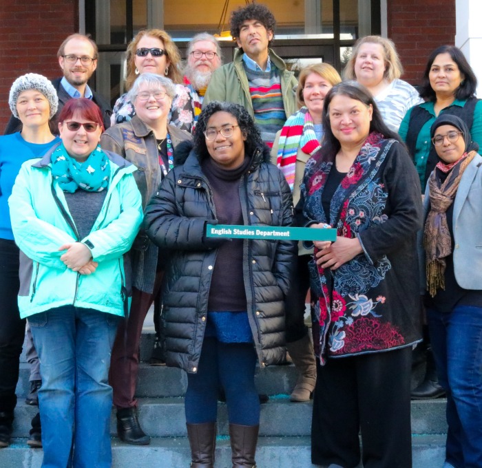 English Studies Department Faculty on the stairs of Thompson Hall