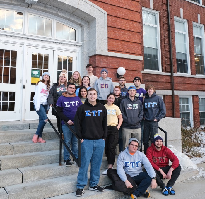 Greek Life Council Members on the stairs of Percival Hall