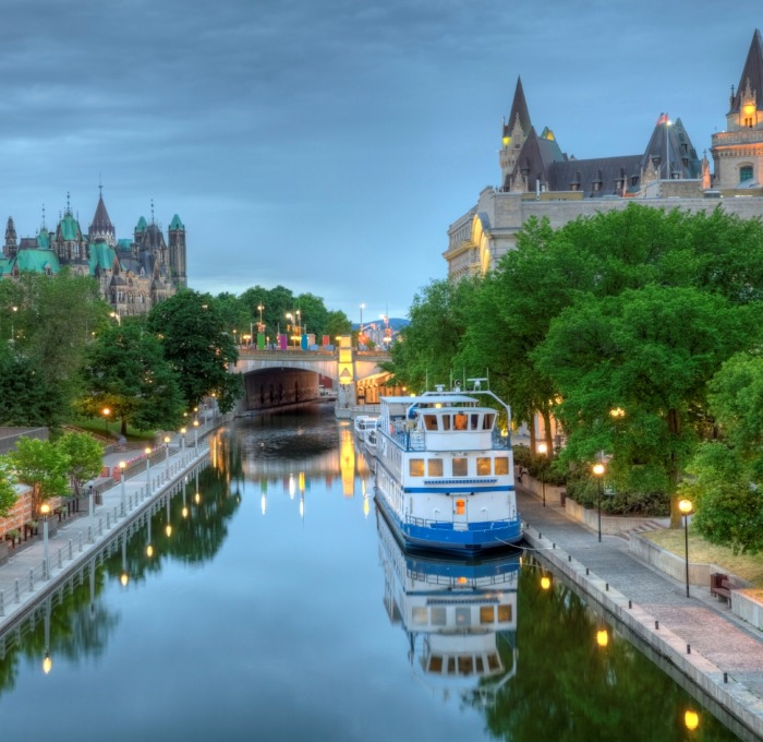 Canada with view of city and a boat on the Quebec River