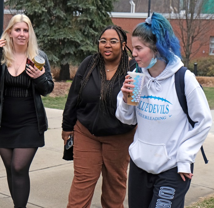 Female students walking on the quad
