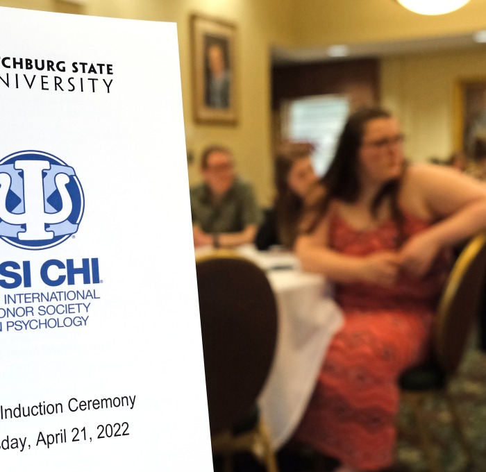 Psi Chi Honor Society Induction Ceremony brochure and recipients in Presidents Hall