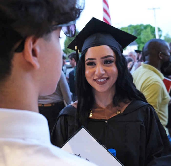 Female graduate student outside rec center