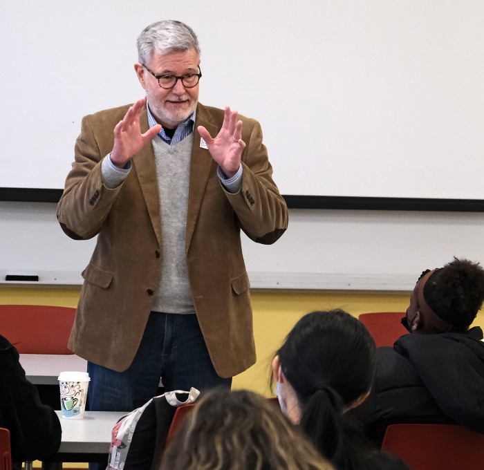 Mike Greenwood teaching in front of the class