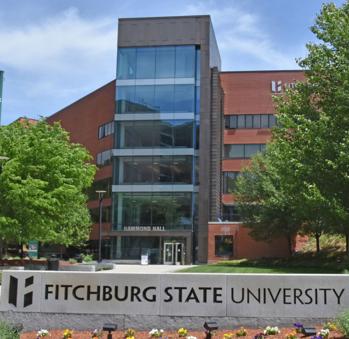 Front view of Hammond Hall with Fitchburg State University sign.