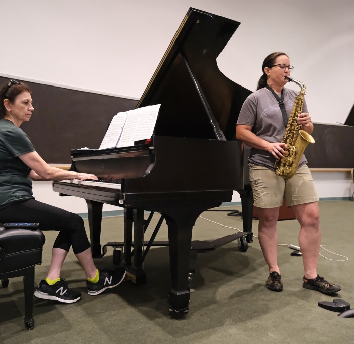 Music teachers rehearsing on piano and saxophone in Kent Recital Hall