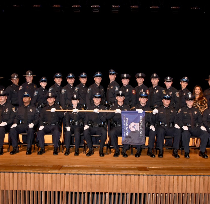 Group shot of the Police Academy Graduating Class Sept. 2022 in Weston Auditorium