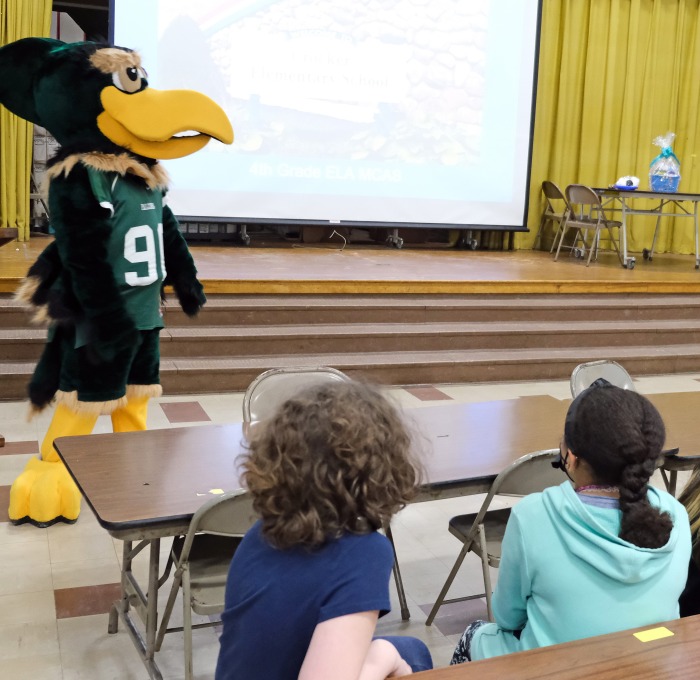 Crocker principal and teacher talking to students with Freddy