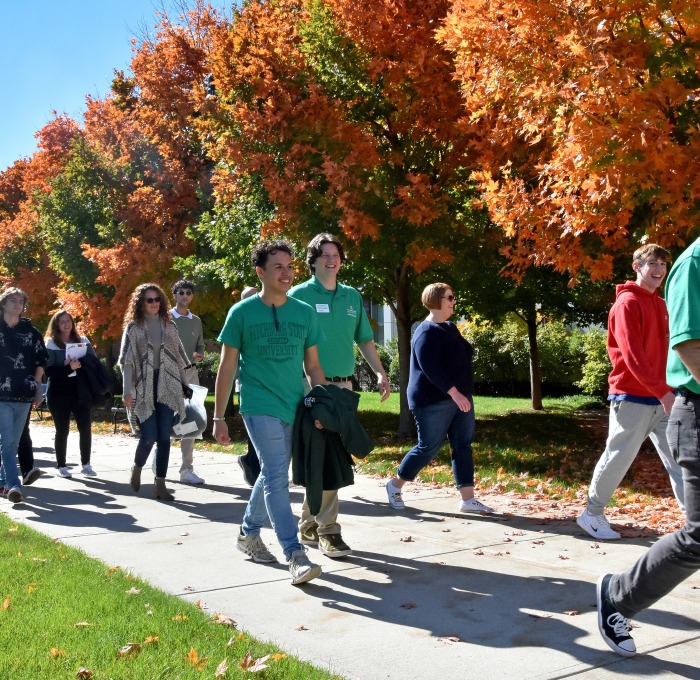 Fall open house tour on the quad with fall foliage in trees