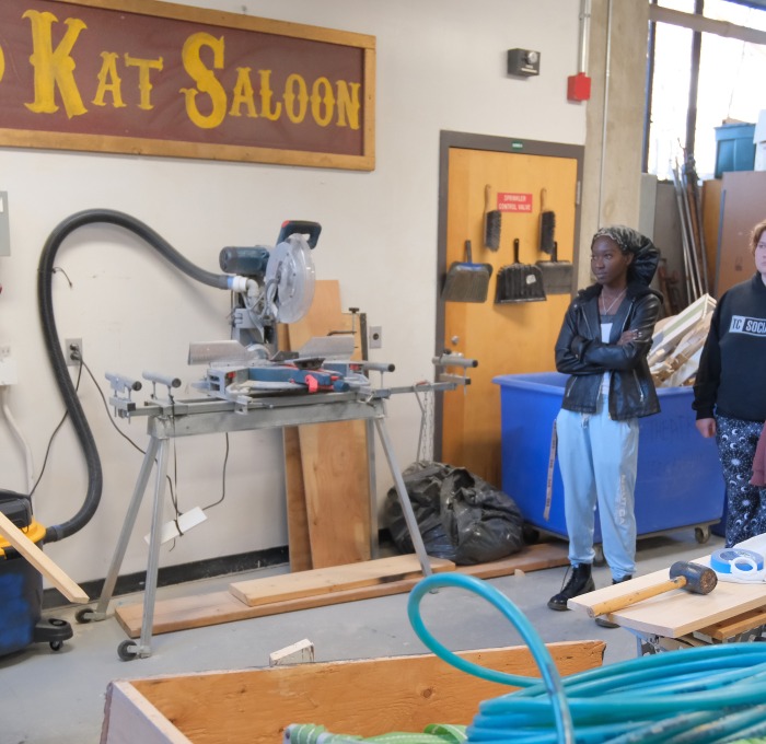 Technical theater shop instructor and students