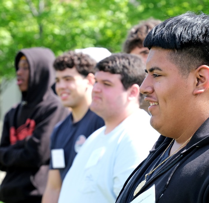 Male students on quad at orientation