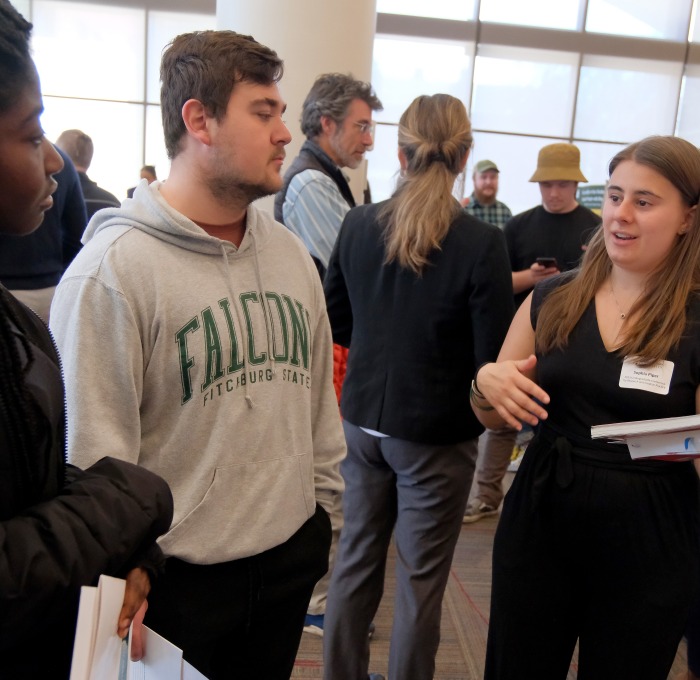 Undergraduate Research Conference student presentations in the main lounge of Hammond