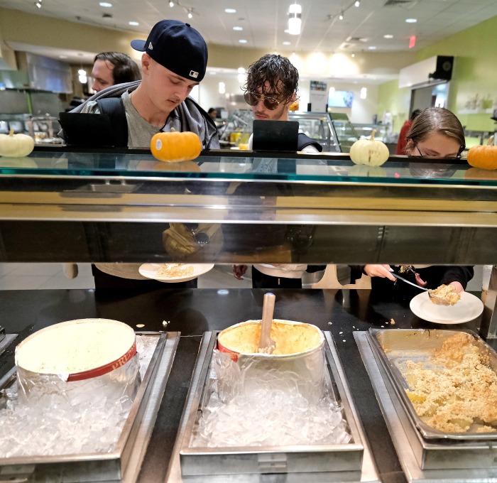 Students getting food in dining hall