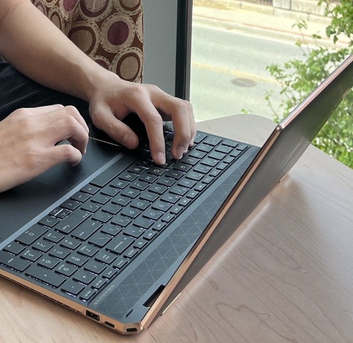 Hands on a laptop computer