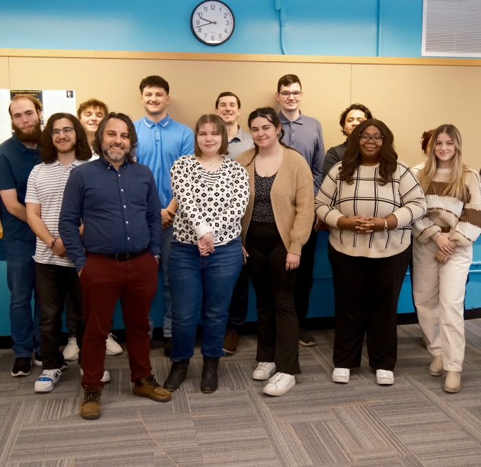 Live Saving Class Project Group Photo Students with Attorney General, President Hodge, and Kyle Moody