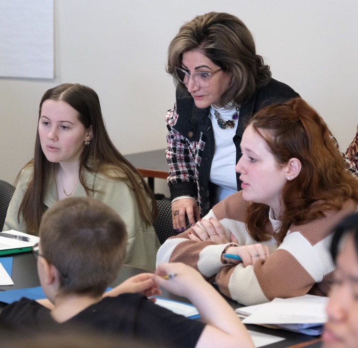 Mojdeh Dean of Education in class with students
