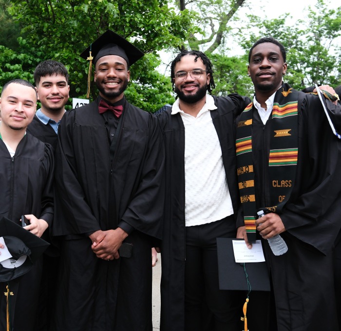 Male graduates before undergrad ceremony