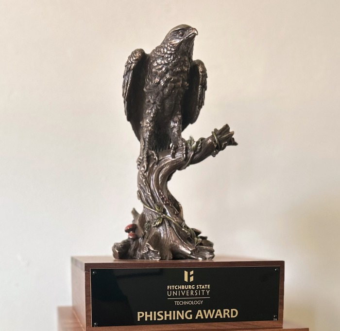 Falcon on a pedestal trophy.